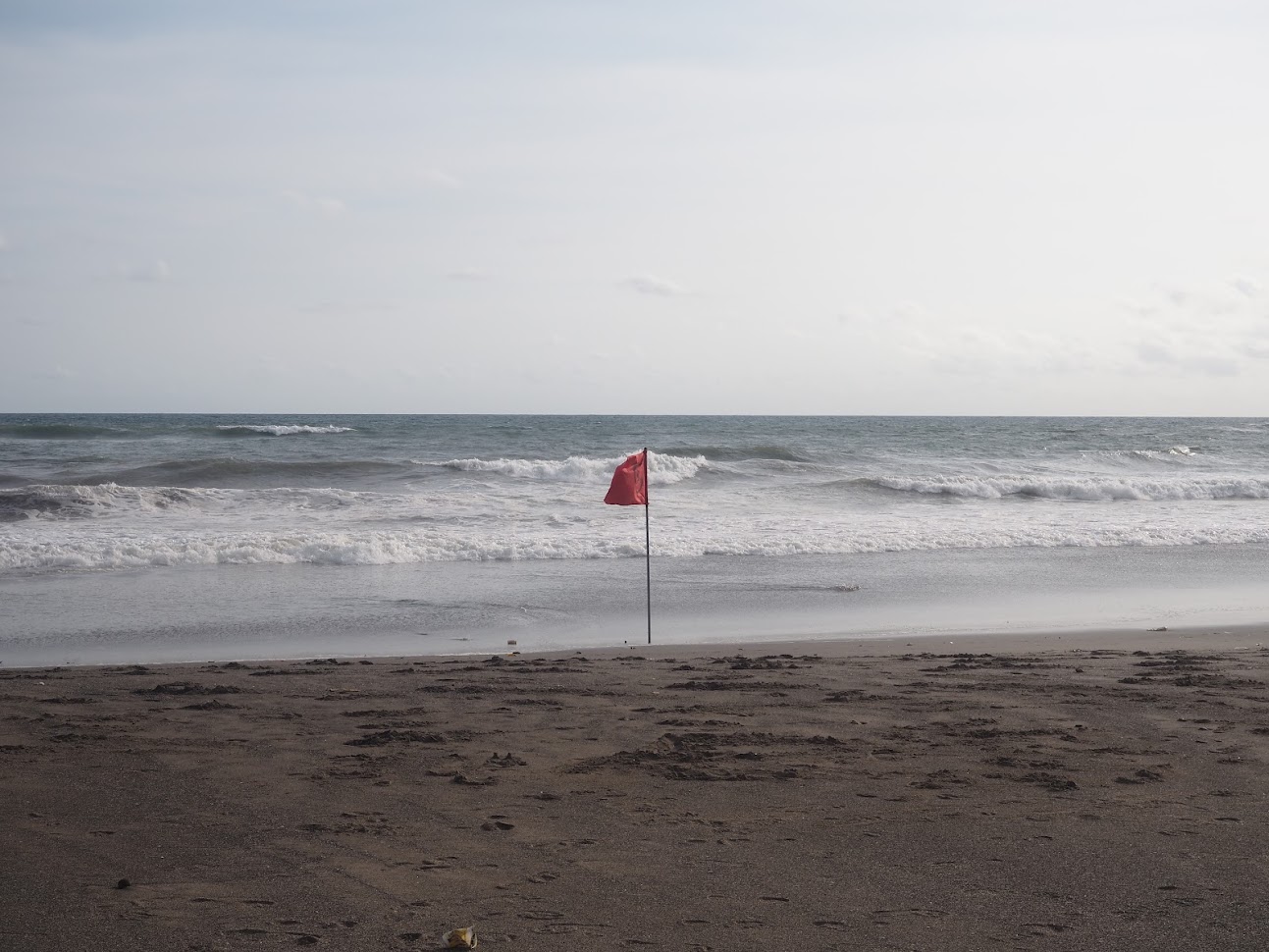 Flag in the sand